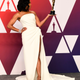 Regina King, in Oscar de la Renta, poses in the press room with her Best Supporting Actress Oscar.